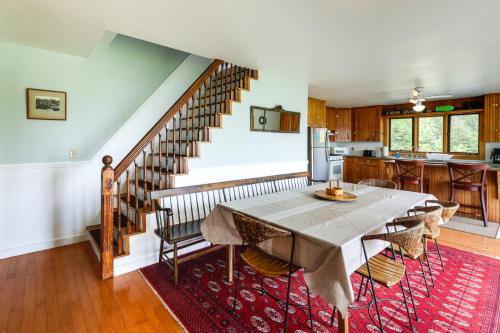 a kitchen and dining room with a table and chairs at Shorefront House with Views, 14 Mi to Acadia NP in Sullivan