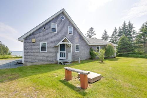a house with a large yard in front of it at Shorefront House with Views, 14 Mi to Acadia NP in Sullivan