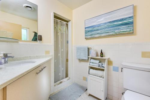 a bathroom with a sink and a shower at Siesta Key Oasis with Outdoor Pool and Screened Lanai! in Siesta Key