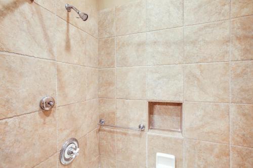 a bathroom with a shower with a glass door at Pet-Friendly Silver Mountain Studio Mountain View in Kellogg
