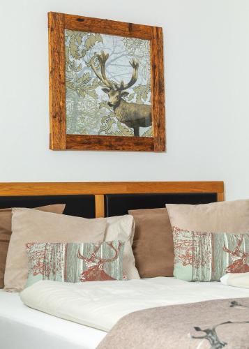 Cama o camas de una habitación en Appartements Alpengarten