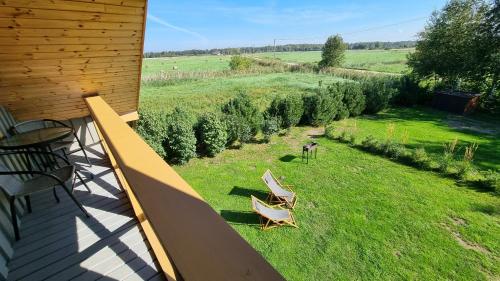 an overhead view of two chairs on a lawn at Smiltinas in Nidden