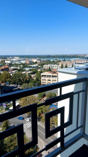 a view of a city from a balcony at RubiCon GreenResidence in Karaburma
