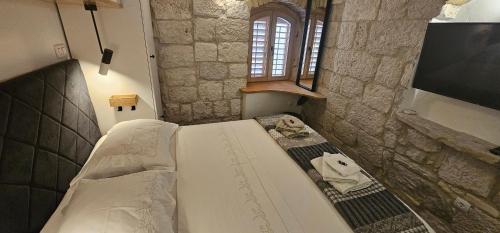 Krevet ili kreveti u jedinici u okviru objekta Magical Oasis for two in Korcula Old Town