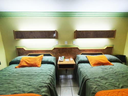 Postel nebo postele na pokoji v ubytování Hotel Marques de Cima