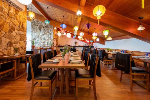 En restaurant eller et andet spisested på Wanderlust Experience Hotel BW Signature Collection OFICIAL