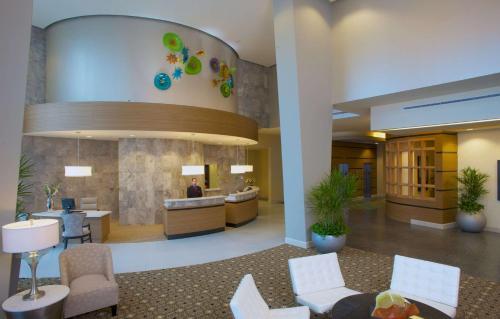 a lobby of a hotel with a reception desk at Hampton Inn & Suites by Hilton Miami Downtown/Brickell in Miami