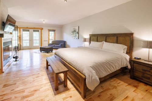 Katil atau katil-katil dalam bilik di Auberge Du Vieux Moulin