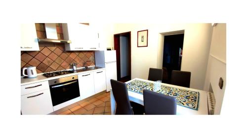 O bucătărie sau chicinetă la La Suite di Florì