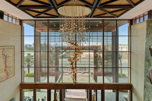 a chandelier in the lobby of a building at Hilton Cabo Verde Sal Resort in Santa Maria