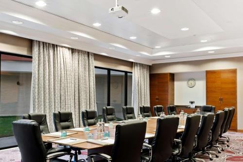 a conference room with a long table and chairs at Hilton Cabo Verde Sal Resort in Santa Maria