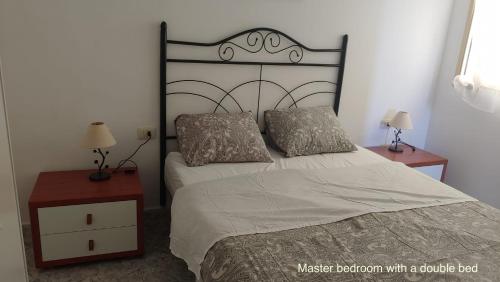Łóżko lub łóżka w pokoju w obiekcie Marina View