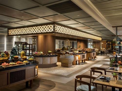 A restaurant or other place to eat at DoubleTree by Hilton Surabaya