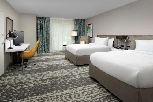 Ένα ή περισσότερα κρεβάτια σε δωμάτιο στο Hilton Garden Inn Miami Brickell South
