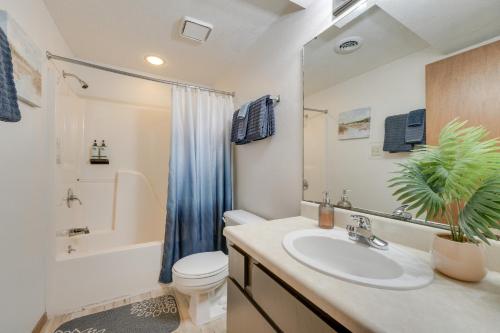 a bathroom with a sink and a toilet and a shower at 3 Mi to Silver Dollar City! Family Getaway w/ Pool in Branson
