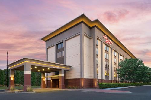 a rendering of a hotel building at Hampton Inn Denver-International Airport in Denver