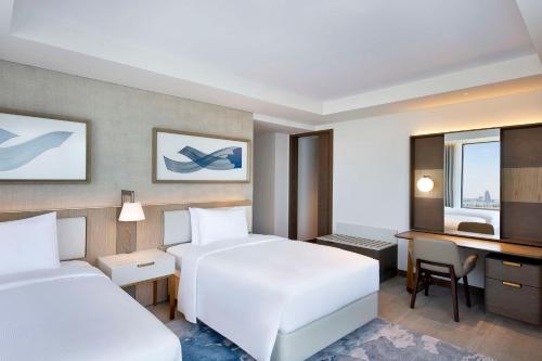  Hilton Abu Dhabi Yas Island -  Chambre  photo :   Tea/Coffee maker    Shower    Bath                           