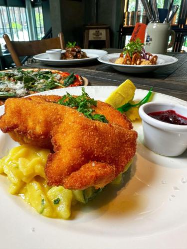 a plate of food on a table with food at Telegraphenamt in Berlin