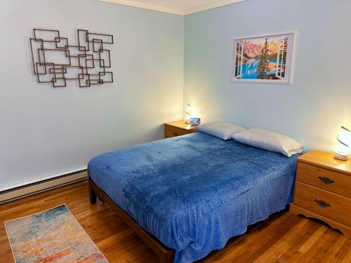 Кровать или кровати в номере Captain's Suite @ The Homestead Oceanfront