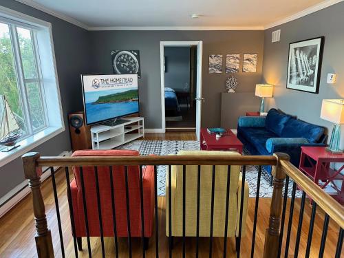 Телевизор и/или развлекательный центр в Captain's Suite @ The Homestead Oceanfront