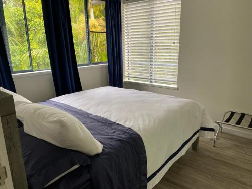 Ένα ή περισσότερα κρεβάτια σε δωμάτιο στο Stunning Beachfront Apartment
