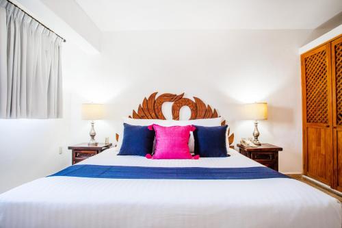 Katil atau katil-katil dalam bilik di Hotel Suites Mar Elena