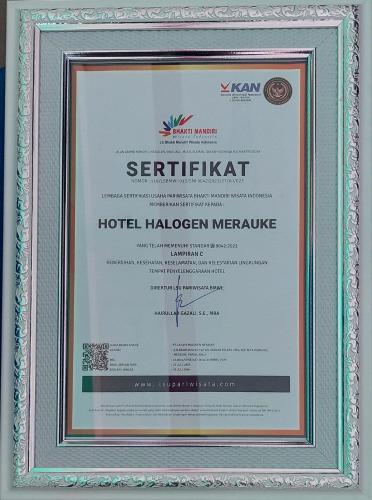 a picture of a certificate in a picture frame at Halogen Hotel Merauke in Merauke