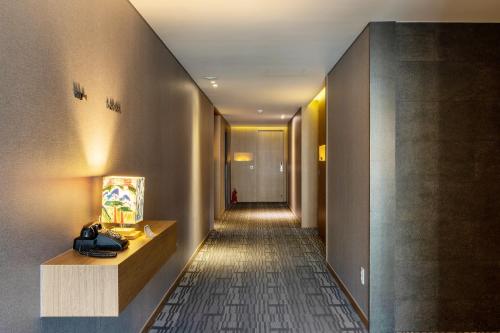 a hallway of a hotel with a hallwayngth at Mate Hotel Paju in Paju