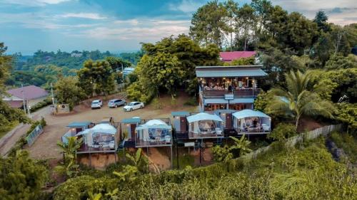 an aerial view of a house with people on the balcony at Style Paidoi Resort in Ban Pa Yang (3)