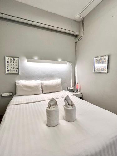 Cama o camas de una habitación en Hobnob Hostel