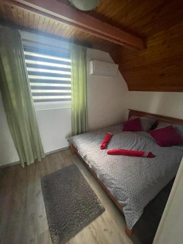 Postel nebo postele na pokoji v ubytování Chill apartman