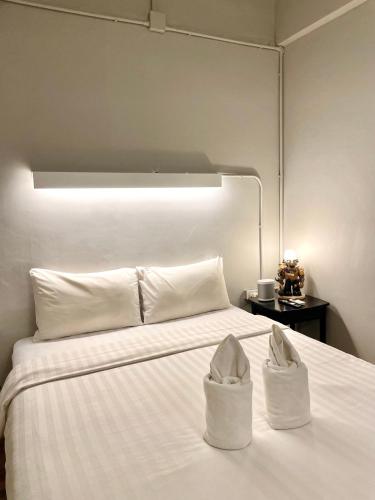 Cama o camas de una habitación en Hobnob Hostel