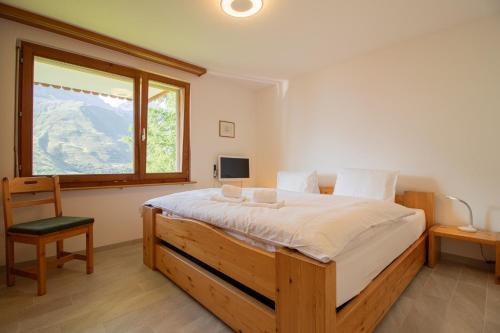 Un pat sau paturi într-o cameră la Sillur 2 - Apartment in Innerarosa