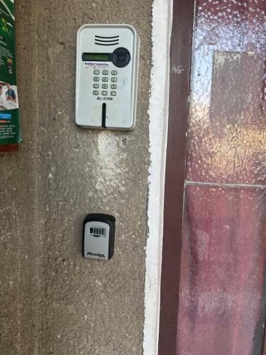 a remote control sitting on the side of a door at Bulevard Residence in Drobeta-Turnu Severin