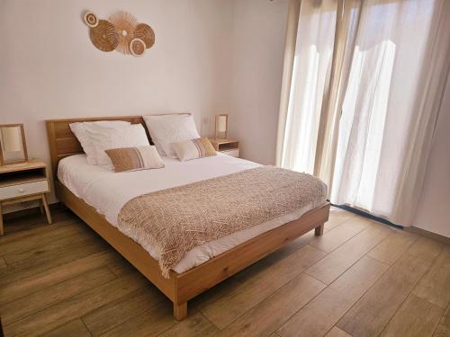 Posteľ alebo postele v izbe v ubytovaní Résidence Villas Chléa