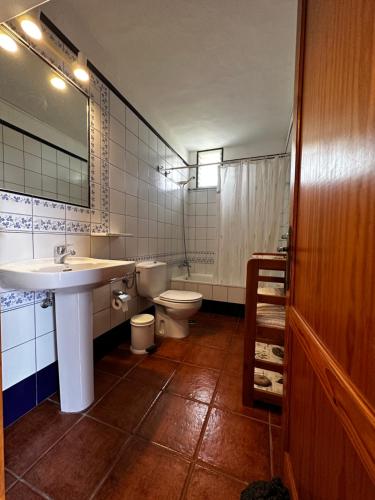 a bathroom with a sink and a toilet at CASA COREA IV in Puntagorda