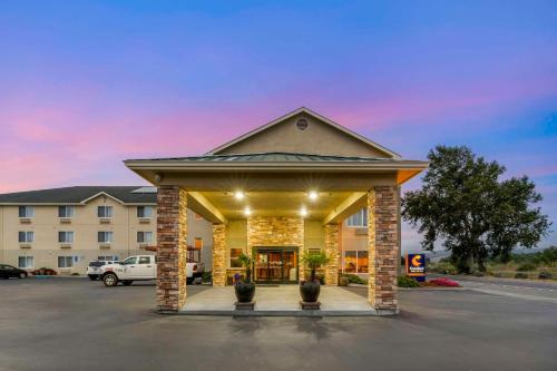 a hotel with a gazebo in a parking lot at Comfort Inn & Suites Redwood Country in Fortuna