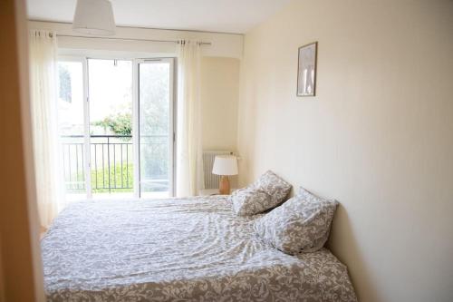 Postel nebo postele na pokoji v ubytování Stade de France 6 pers