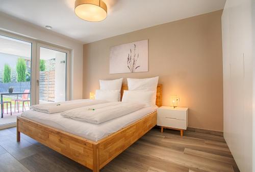 מיטה או מיטות בחדר ב-Apartment Lavendel