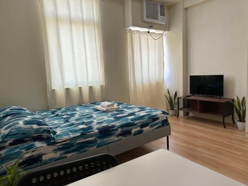 Μια τηλεόραση ή/και κέντρο ψυχαγωγίας στο Neat Unit in Holland Park Southwoods