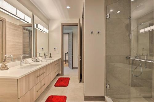 a bathroom with two sinks and a shower at Luxurious Home, Walk to Beaver Creek Gondola! in Avon