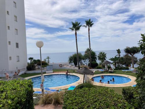 The swimming pool at or close to Apartamento SeaView