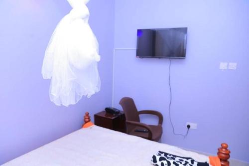 TV a/nebo společenská místnost v ubytování M3 Stella Hotel