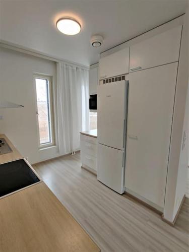 TV a/nebo společenská místnost v ubytování Kotimaailma Furnished Apartment with sauna