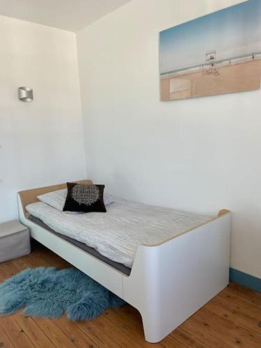 Un ou plusieurs lits dans un hébergement de l'établissement En plein coeur du Crotoy, un pied à terre en Baie