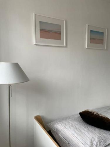 Un ou plusieurs lits dans un hébergement de l'établissement En plein coeur du Crotoy, un pied à terre en Baie