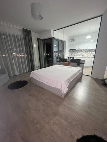 En eller flere senge i et værelse på Corporate One Room Pipera