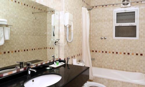 Koupelna v ubytování Al Maha Int Hotel Oman