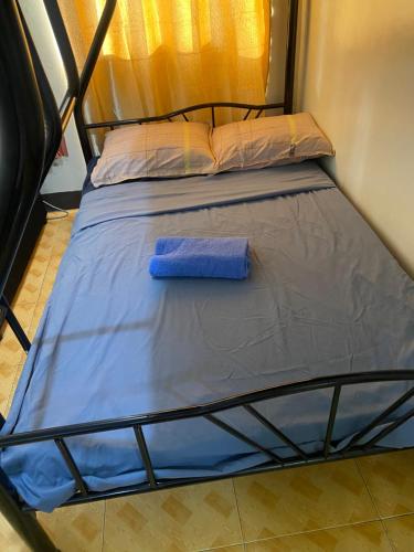 Postel nebo postele na pokoji v ubytování Bagobantay hostel