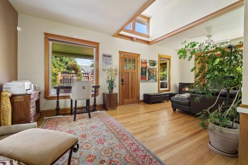 a living room with a couch and a window at Geneva Retreat in Bellingham